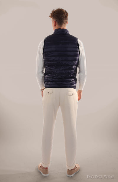 Men's-blue-bomber-jacket-model-standing-in-the-back-profile-elegant-design