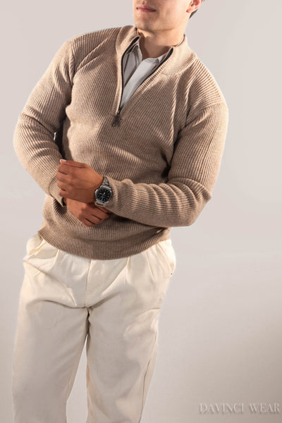 The-male-model-wears-a-beige-knitted-sweater-front-view-with-zipper-elegant-and-cozy-design