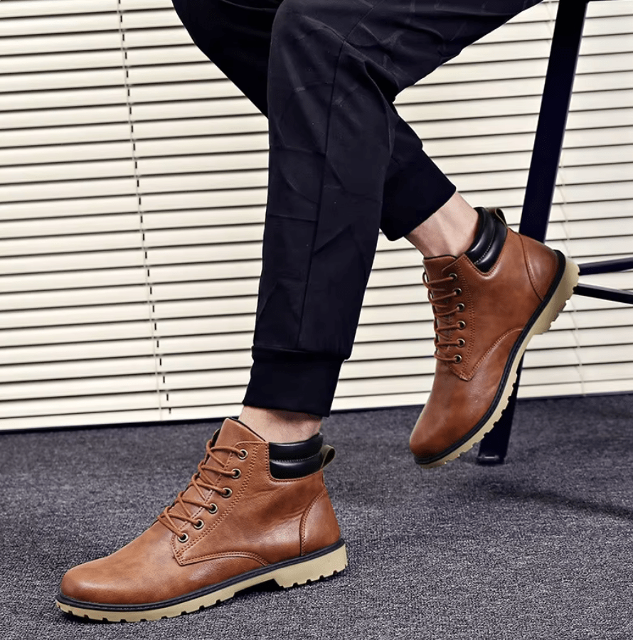 Brown-leather-boots-with-bright-sole-and-black-details-robust-and-casual-design