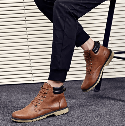 Brown-leather-boots-with-bright-sole-and-black-details-robust-and-casual-design