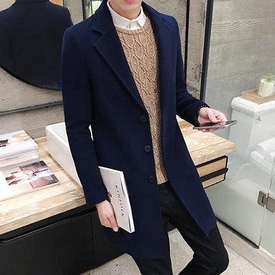 Men's-coat-in-dark-blue-wool-with-a-knitted-jacket-underneath-for-a-smart-casual-ensemble"