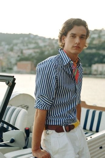 men's-striped-shirt-with-long-sleeves-design-relaxed-on-sun-lounger-mediterranean-lifestyle