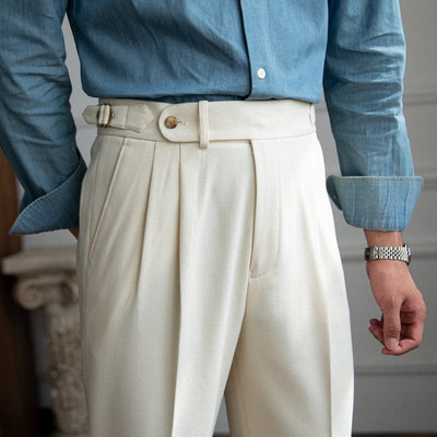 men's-white-high-waisted-trousers-with-side-buckle-model-standing-in-profile-vintage-style