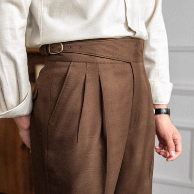 The-male-model-wears-brown-trousers-with-a-high-waistband-elegant-and-classic-design