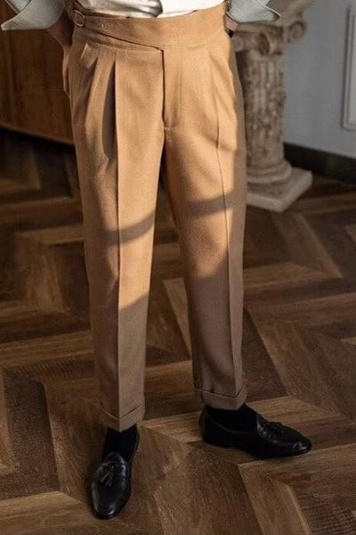 The-male-model-wears-orange-trousers-with-a-high-waistband-elegant-and-classic-design