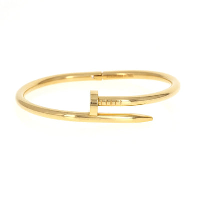 gold-stainless-steel-bracelet-in-a-nail-design-model-flowing-timeless-undercooled-elegance