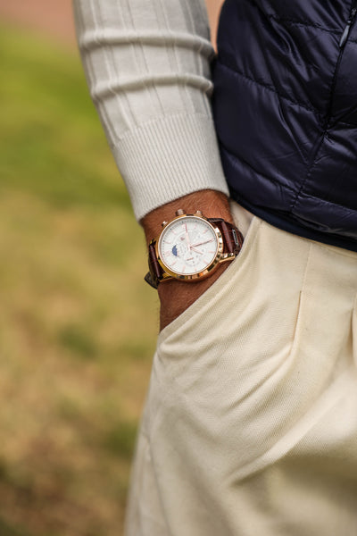 Luxury-men's-watch-with-brown-leather-bracelet-silver-dial-and-elegance