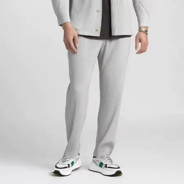 Men's gray ribbed trousers with a loose fit and modern silhouette - elegantly styled.