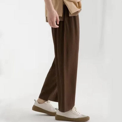 Men's-brown-rib-trousers-with-loose-fit-and-modern-silhouette-elegantly-styled.