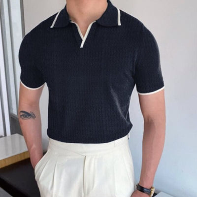 Polo bleu foncé pour hommes avec col et détails blancs