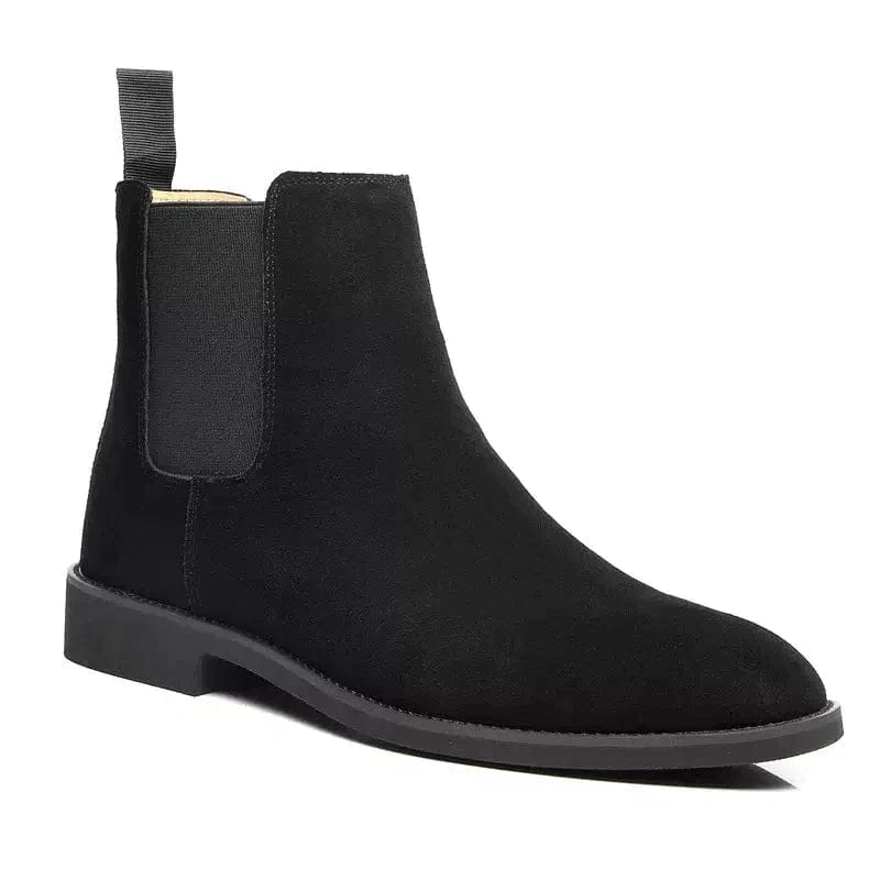 Bottes de Chelsea en daim noir avec semelle claire et empiècements élastiques, design élégant et intemporel